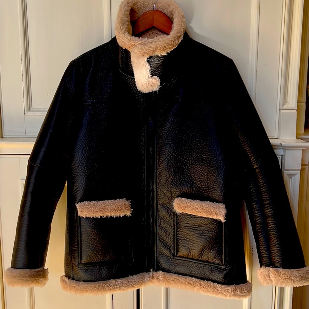 Vince Camuto faux leather brown jacket with tan faux fur lining. Never worn.